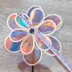 Pinwheel with double-layer structure and six colorful film blades
